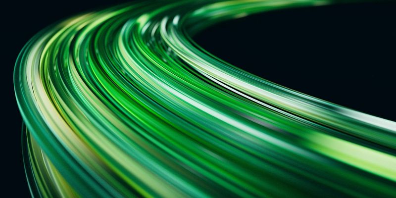 Light trails creating a sense of smooth, controlled motion in the dark.